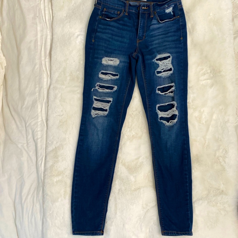 Mudd FLX Stretch Skinny Jeggings. Size 5  Low Rise. Dark Wash. Distressed.